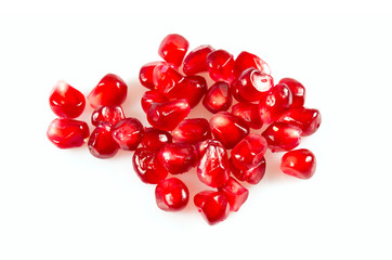 pomegranate seeds isolated on white