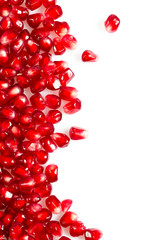 pomegranate seeds isolated on white