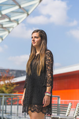 Beautiful woman posing in an urban context