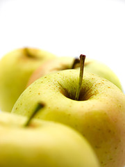 Yellow apples close up isolated on white background