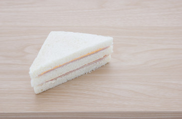 Obraz na płótnie Canvas Sandwich on wood