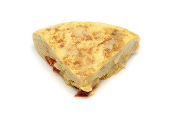 Spanish omelette with olive oil and red pepper isolated