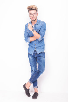full body of a serious casual man wearing jeans clothes