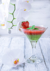 Fresh fruit and berry cocktail  on shabby wooden boards