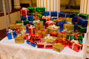 a lot of gifts on the table