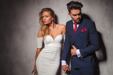 elegant hot couple in dramatic pose