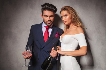 fashion elegant couple ready to drink champagne