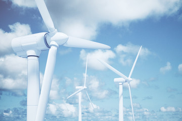 Windmills in the water with sky background