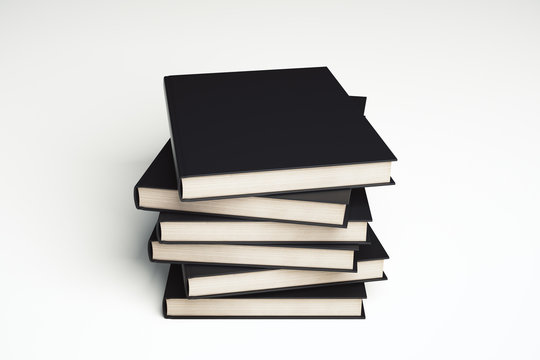 Stack of the black books on a white background