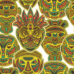 Tribal mask collection. Colorful seamless pattern with ethnic ornament. Retro hand drawn vector illustration