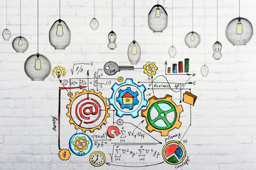 Business scheme concept on yhe brick wall with light bulbs