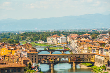 Fototapeta na wymiar Pone Vecchio over Arno river in Florence, Italy.