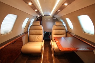 Small business jet cabin - front, right table