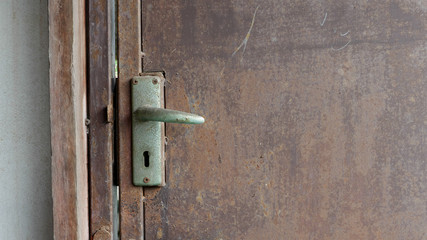 The vintage bolt lock on old door. (1)
