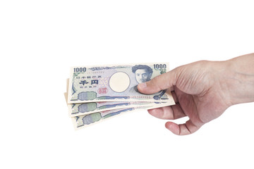 Japanese money Yen in man hand