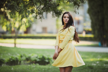 Beautiful girl in yellow dress