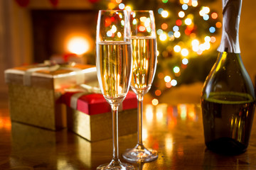 champagne glasses shot on background of Christmas lights