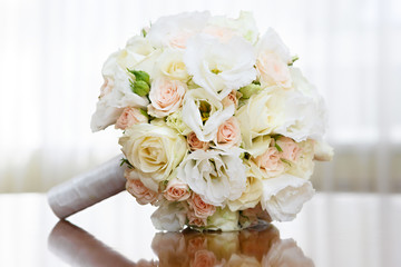 beautiful bridal bouquet of roses at a wedding party
