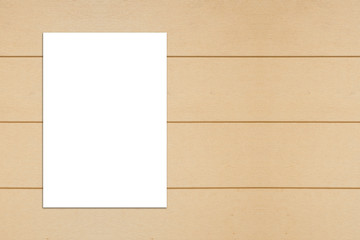 Blank folded paper poster hanging on wooden wall,Template mock up.