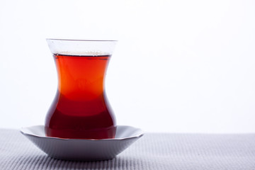 A glass of Turkish black tea