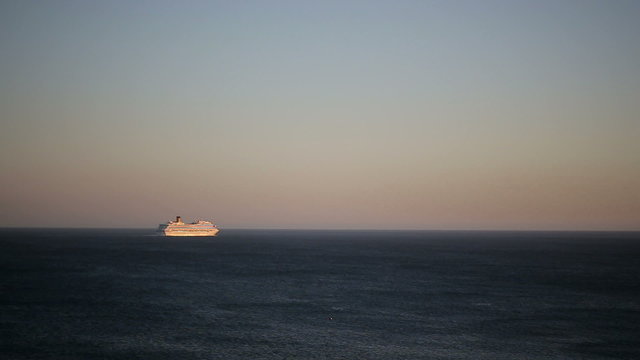 Atlantic liner at Portugal coast lisbon. Sunset ocean.