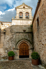 Fototapeta na wymiar old church in the historical quarter of Caceres, Spain