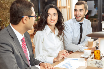 Business meeting in cafe