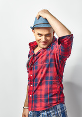 Naklejka premium Young attractive man in hat