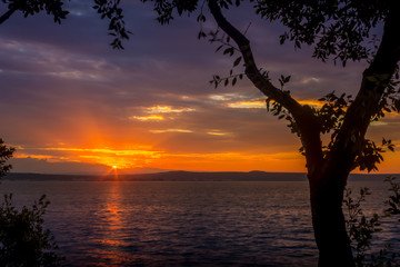 Fototapeta na wymiar Sunset in Kukljica in Croatia, view on the seashore.