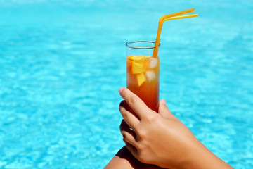 Woman hand with cocktail glass