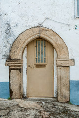 Fototapeta na wymiar Gothic door of Valencia de Alcantara in Spain
