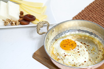 Rich and delicious Turkish breakfast on white wood table