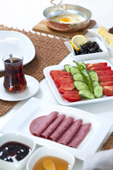 Rich and delicious Turkish breakfast on white wood table