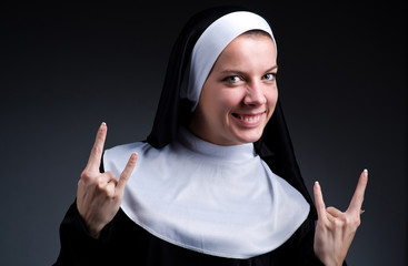 Funny nun showing victory sign