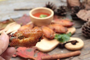 Fried chicken wings with sauce of delicious.