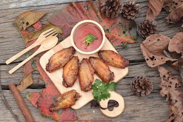 Fried chicken wings with sauce of delicious.