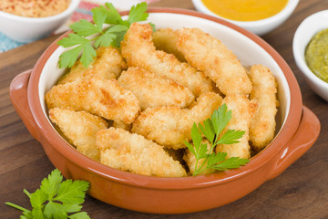 Chicken Goujons- Breaded and deep fried chicken pieces.
