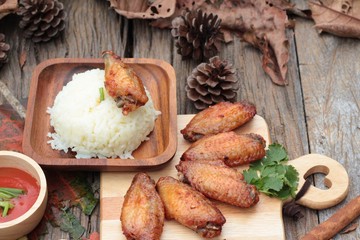 Fried chicken wings with sauce of delicious.