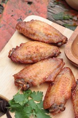 Fried chicken wings with sauce of delicious.