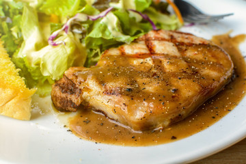 Grilled pork steak and vegetables