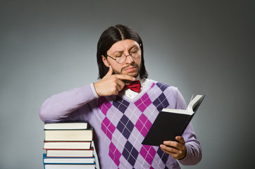 Young student with book in learning concept