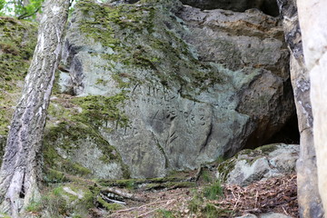 Fototapeta na wymiar Letters in the rock