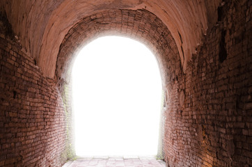Old dark tunnel corridor with arch opening Light at the end of t