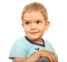 portrait of a smiling blond boy
