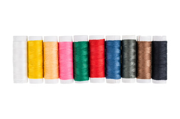 Multicolor sewing threads on background