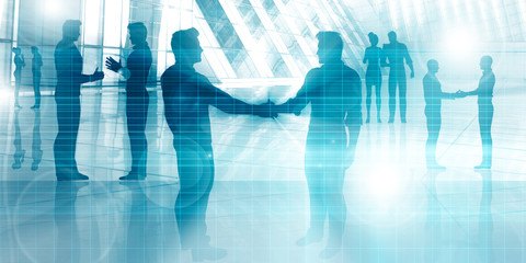 Silhouettes of Two Businessman Shaking Hands