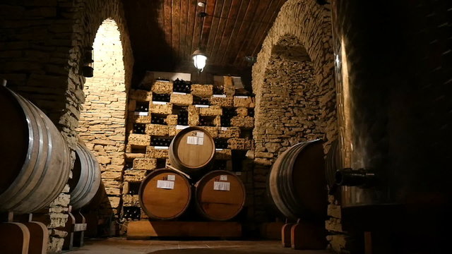 Rows Of Wine Barrels In A Cellar