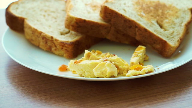 Video of Cream apricot cheese spread the side of toasts dish