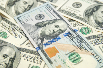 closeup One hundred usa dollars pile as background
