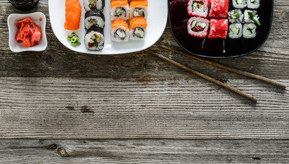 assorted sushi on plates and a text spase